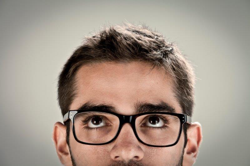 guy with glasses thinking