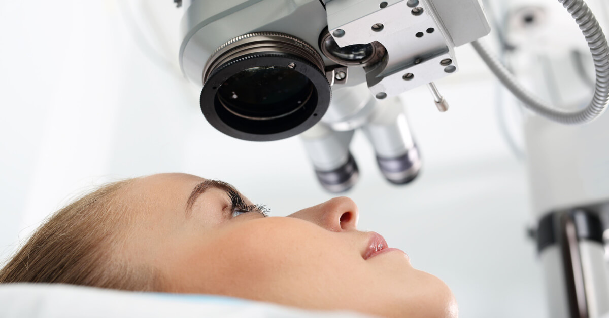 Laser vision correction. A patient in the operating room during ophthalmic surgery